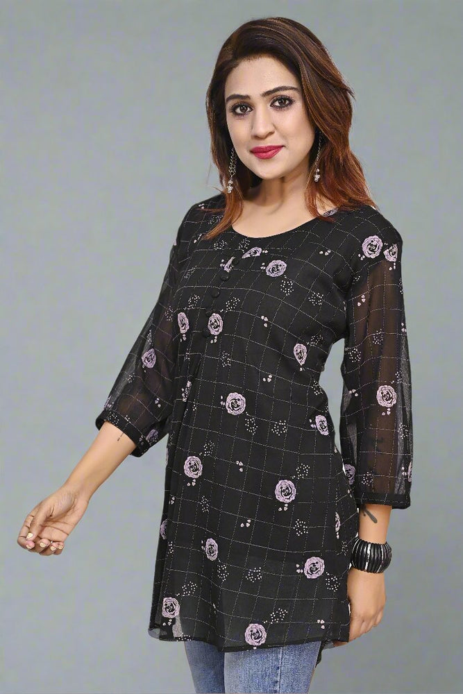 
                      
                        Premium polyester printed top for Women in Black colour
                      
                    