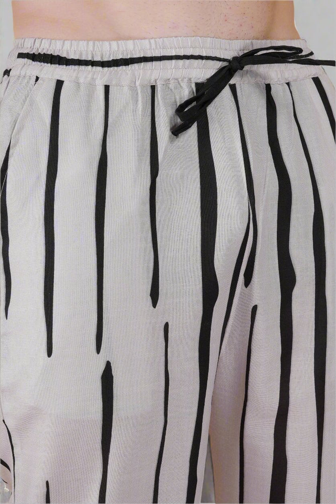 
                      
                        Black Strip Printed on Grey Pajama
                      
                    