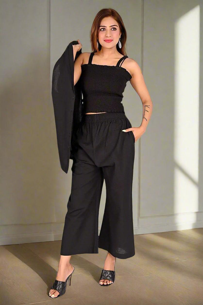 
                      
                        Sleek Noir Sleeveless Cord Set
                      
                    