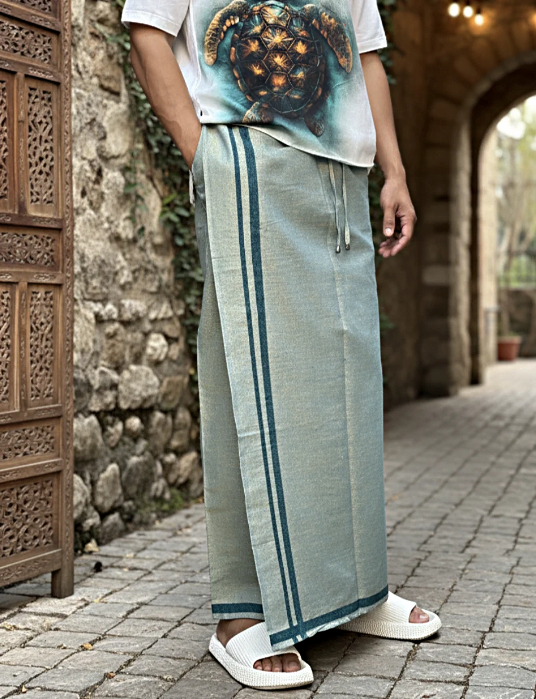 Light green pajamalungi with dark green stripes