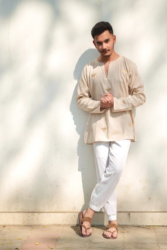 
                      
                        Honey bee embroidered Cotton Kurta & White Pajama Set
                      
                    