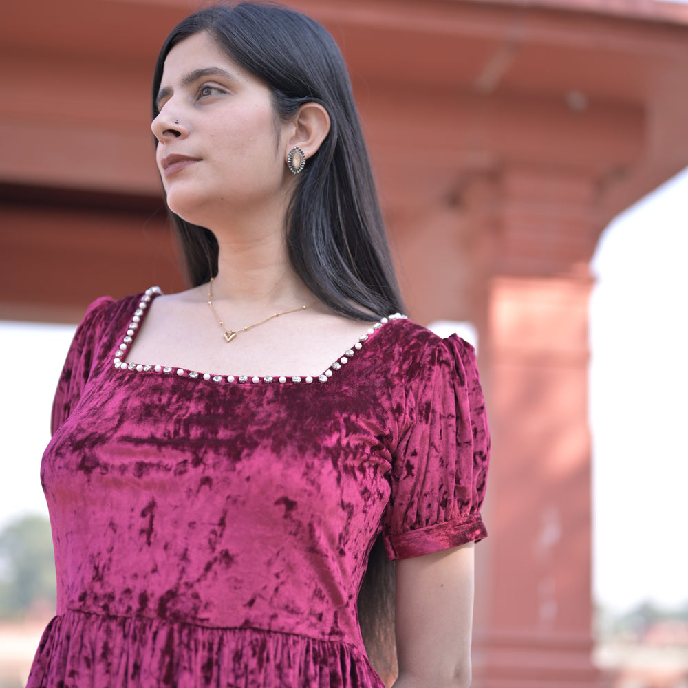 
                      
                        Crimson Square-Neck Velvet Dress with Puff Sleeves.
                      
                    