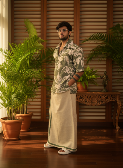 Olive light green big leaves digital print kurta with halfsleeves worn by a model in an indoor setting surrounded by plants.