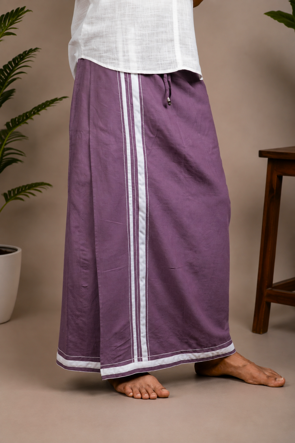 Side view of plum men's lungi with white stripe detail