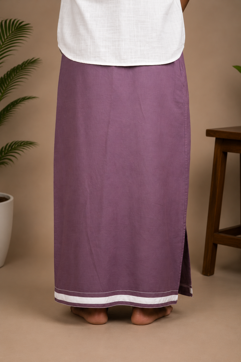 Back view of plum men's lungi with white hem border